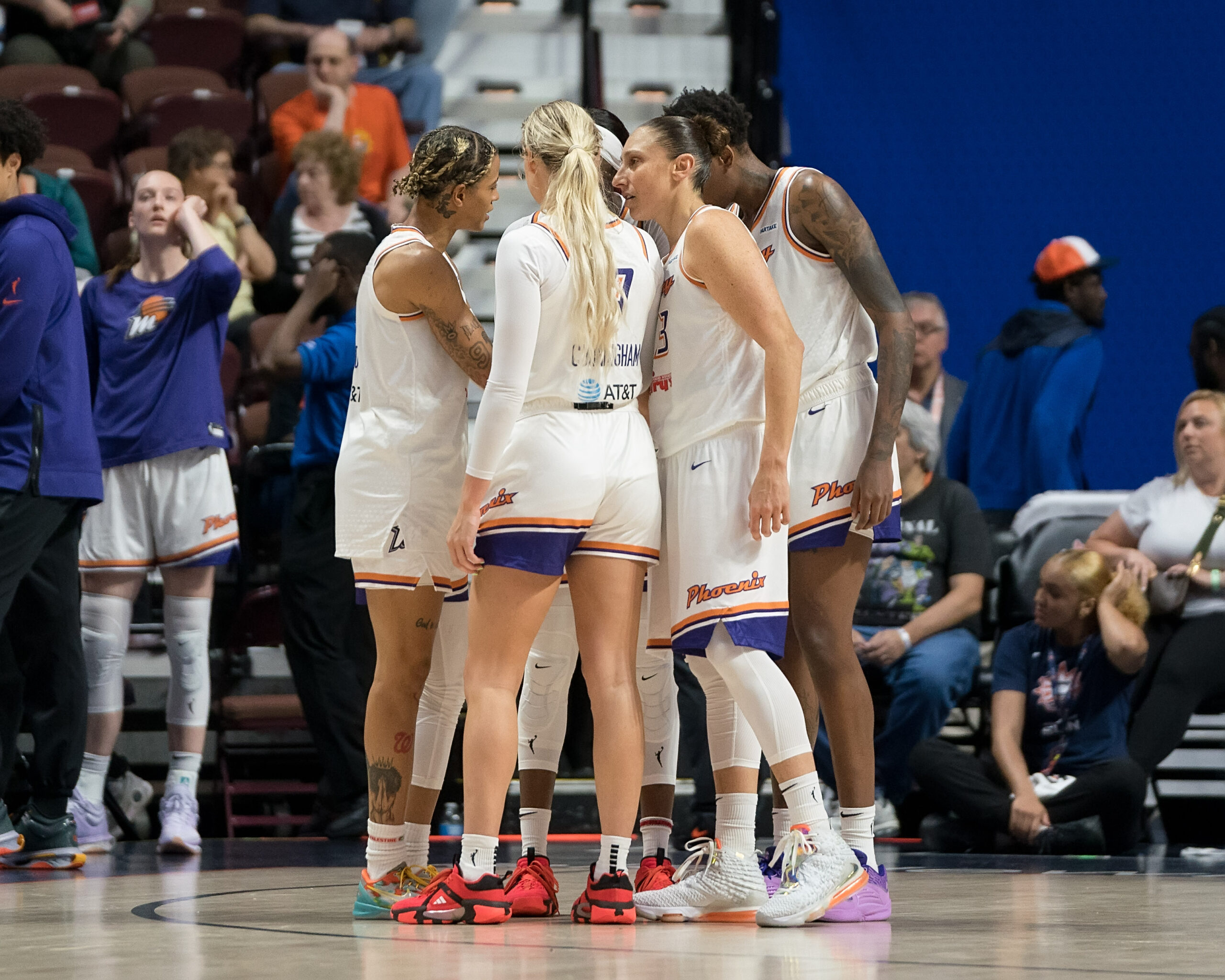 The Phoenix Mercury huddle during a game against the Connecticut Sun