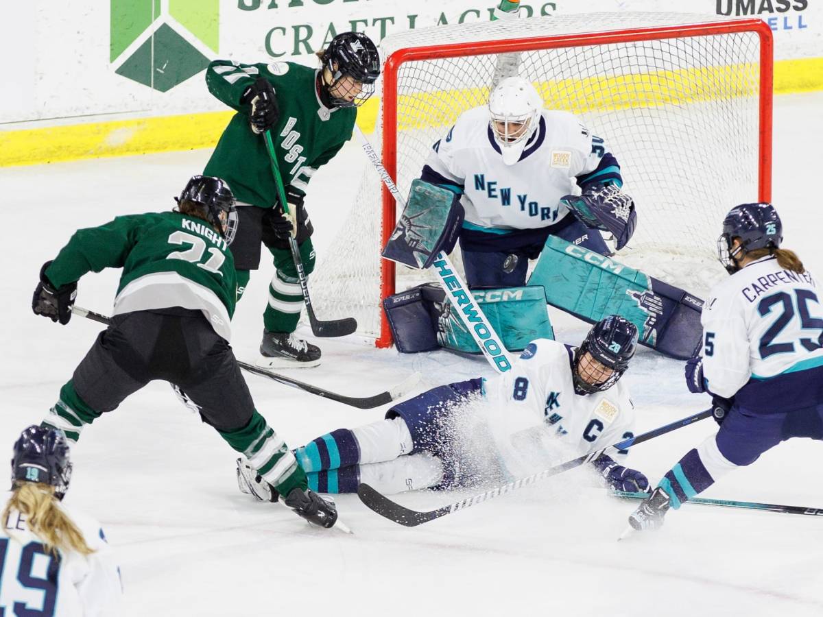 Hilary Knight is stopped by a sliding Micah Zandee-Hart