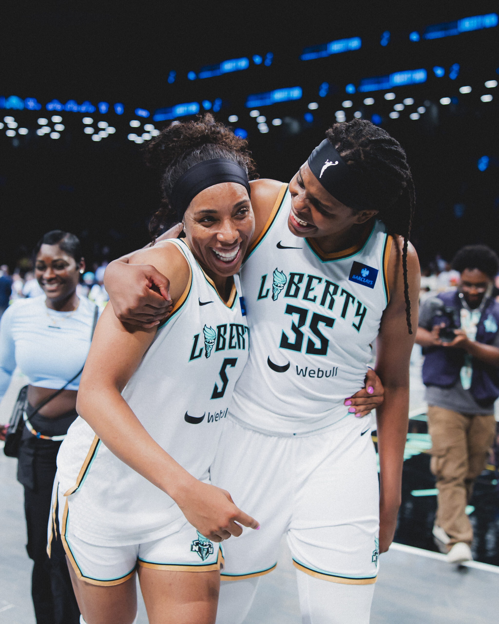 Kayla Thornton and Jonquel Jones embrace
