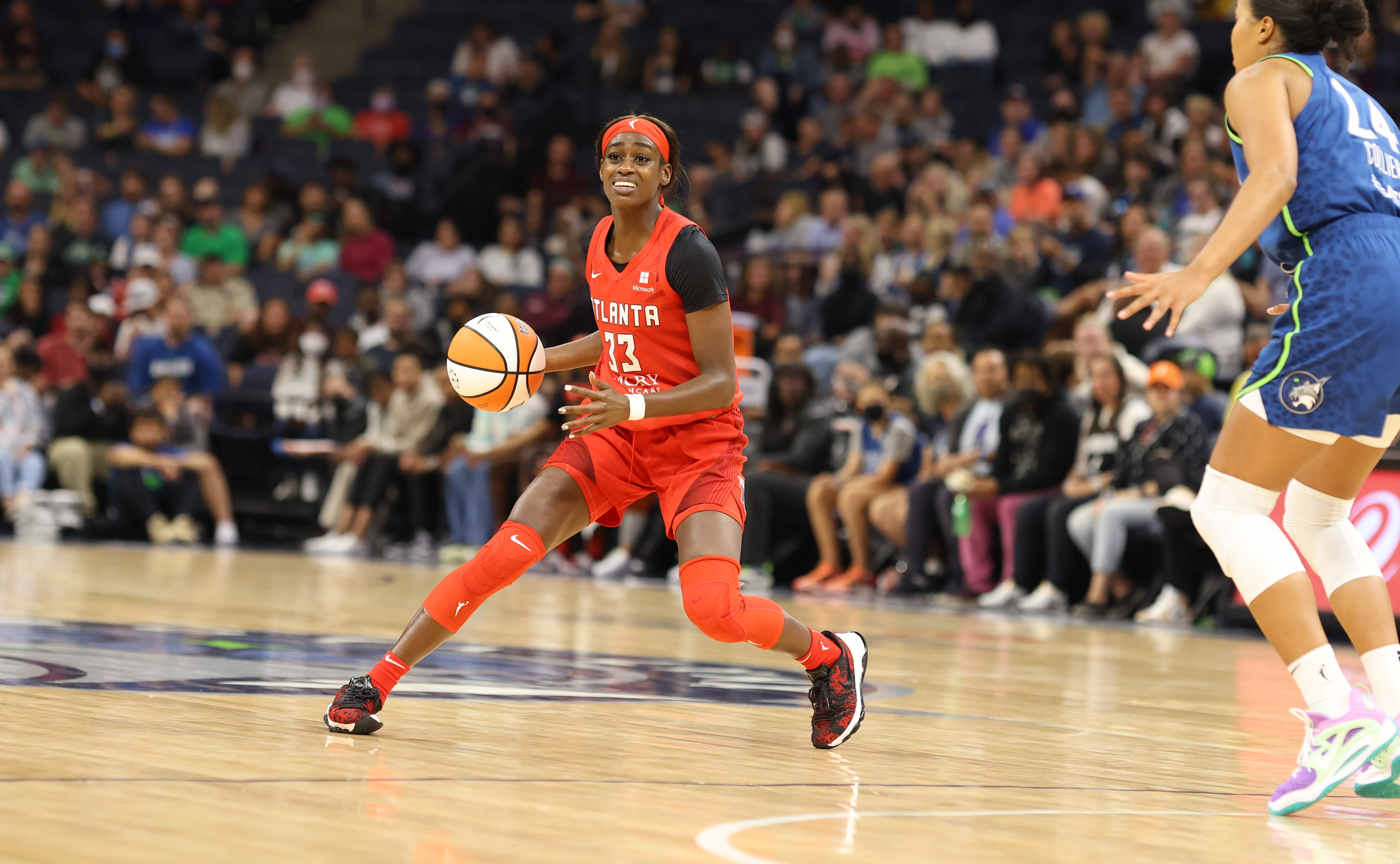 Atlanta Dream wing Maya Caldwell (#33) dribbles the ball in a game against the Minnesota Lynx on August 8, 2022 (Photo credit: John McClellan | The Next)