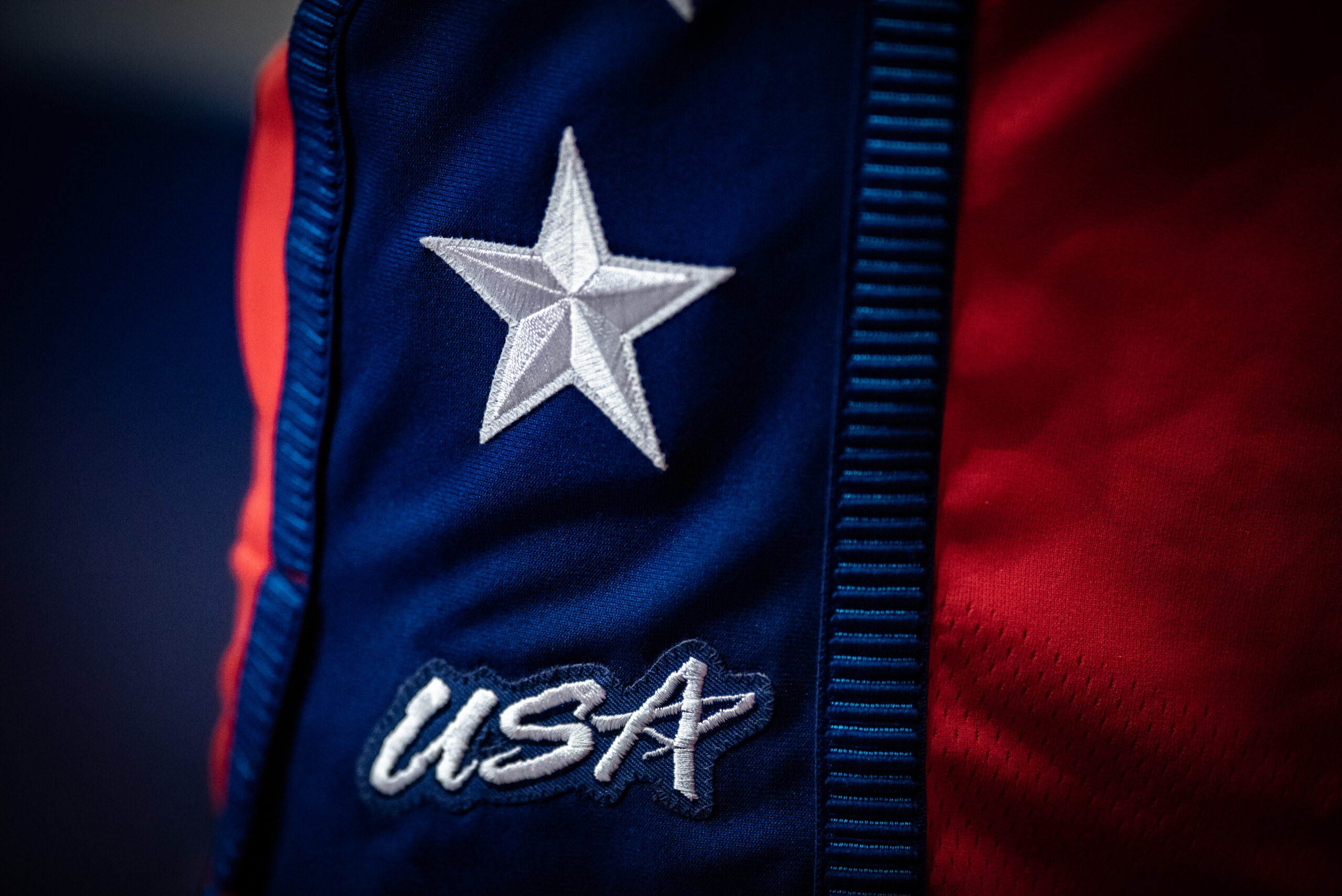 The side of a Team USA player’s red and blue shorts, featuring a silver star and USA patch.