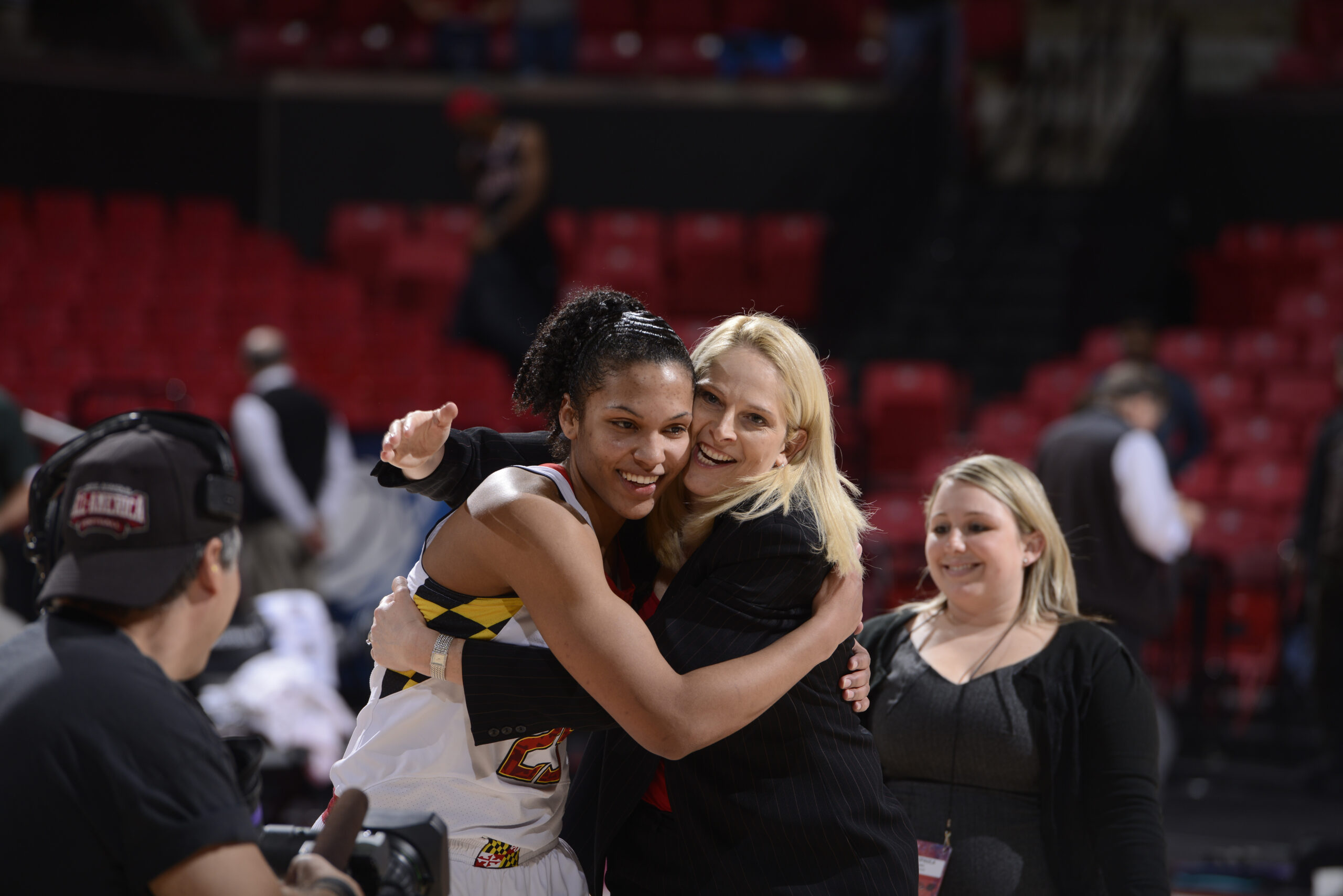 Alyssa Thomas embraces college coach Brenda Frese