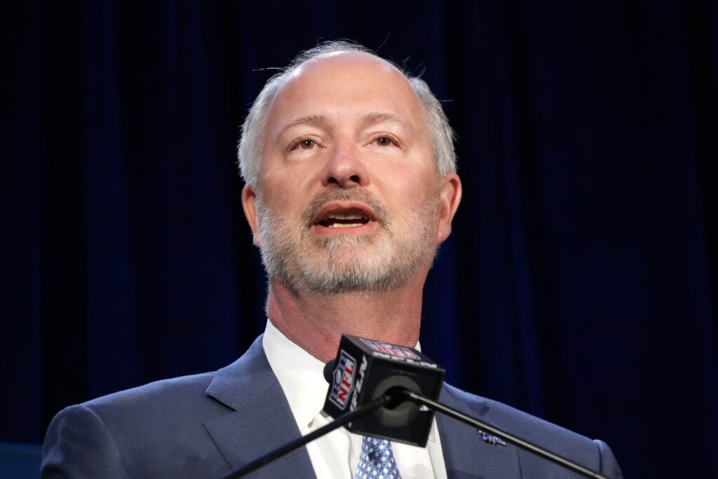 Steve Hill speaks into a microphone.