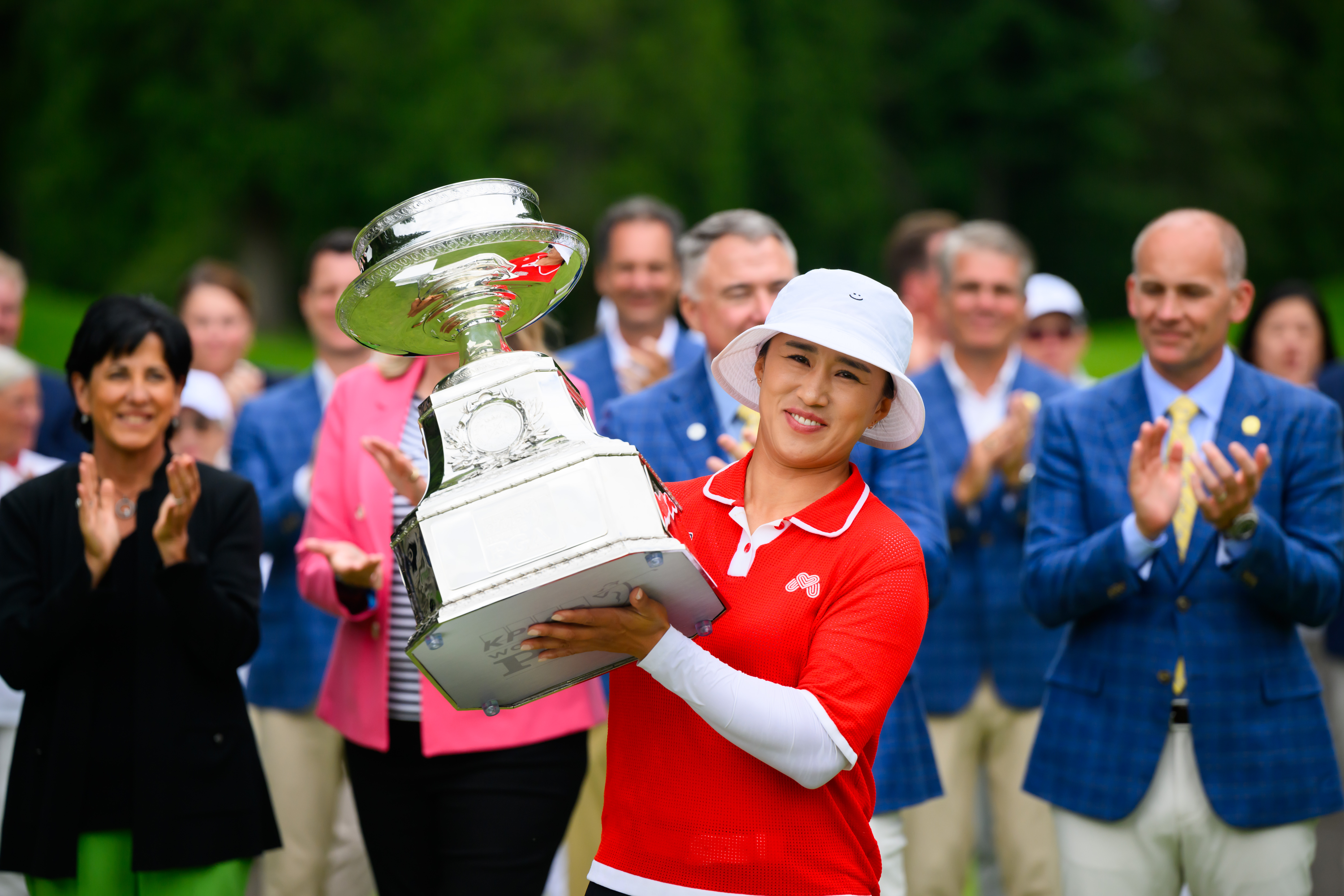 Amy Yang holding the trophy after winning the 2024 KPMG Women's PGA Championship.