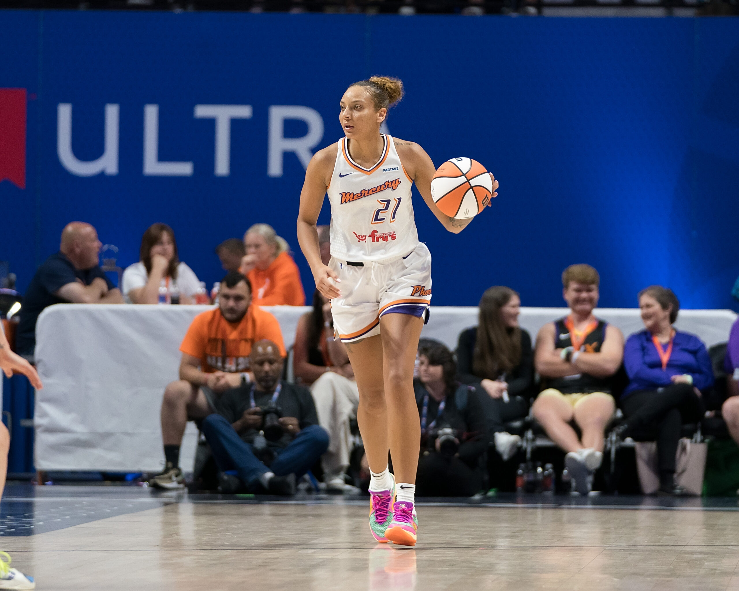 Phoenix Mercury forward Mikiah Herbert Harrigan dribbles the ball during a WNBA game between the Phoenix Mercury and the Connecticut Sun