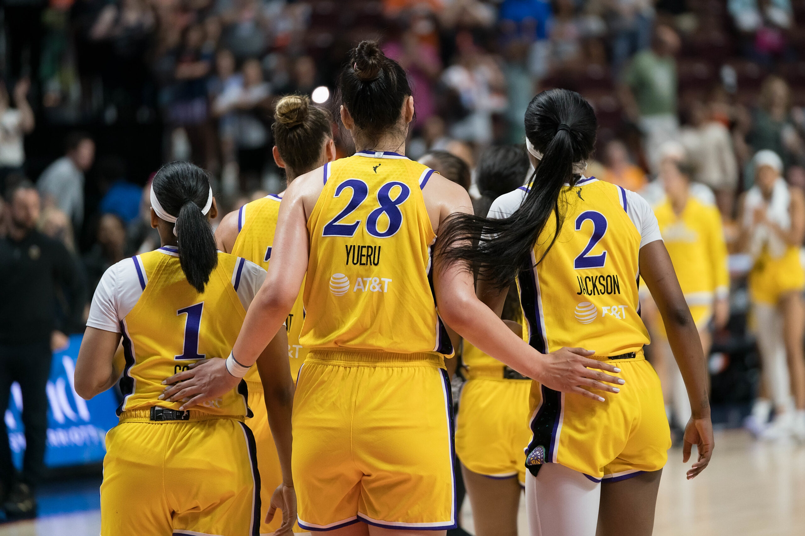 Sparks players in a huddle as the featured image for a story about head coach Curt Miller