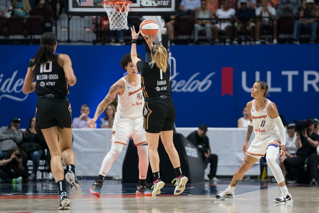 Connecticut Sun guard Rachel Banham elevates to shoot a right-handed jump shot.