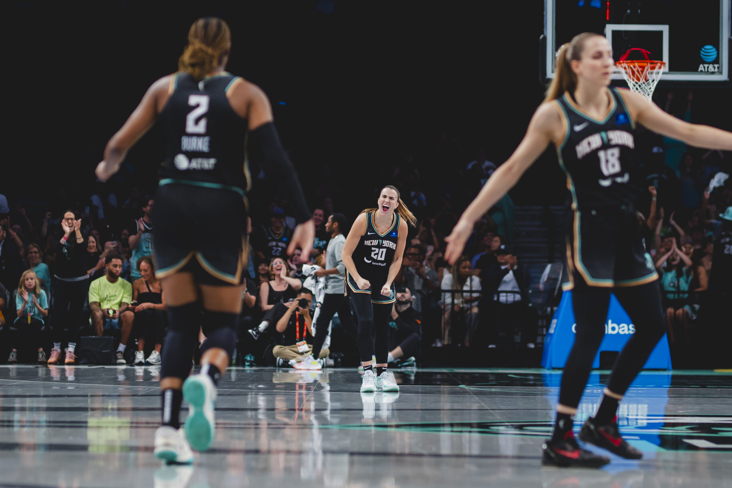 Sabrina Ionescu screams with Kennedy Burke and Ivana Dojkić running back in transition