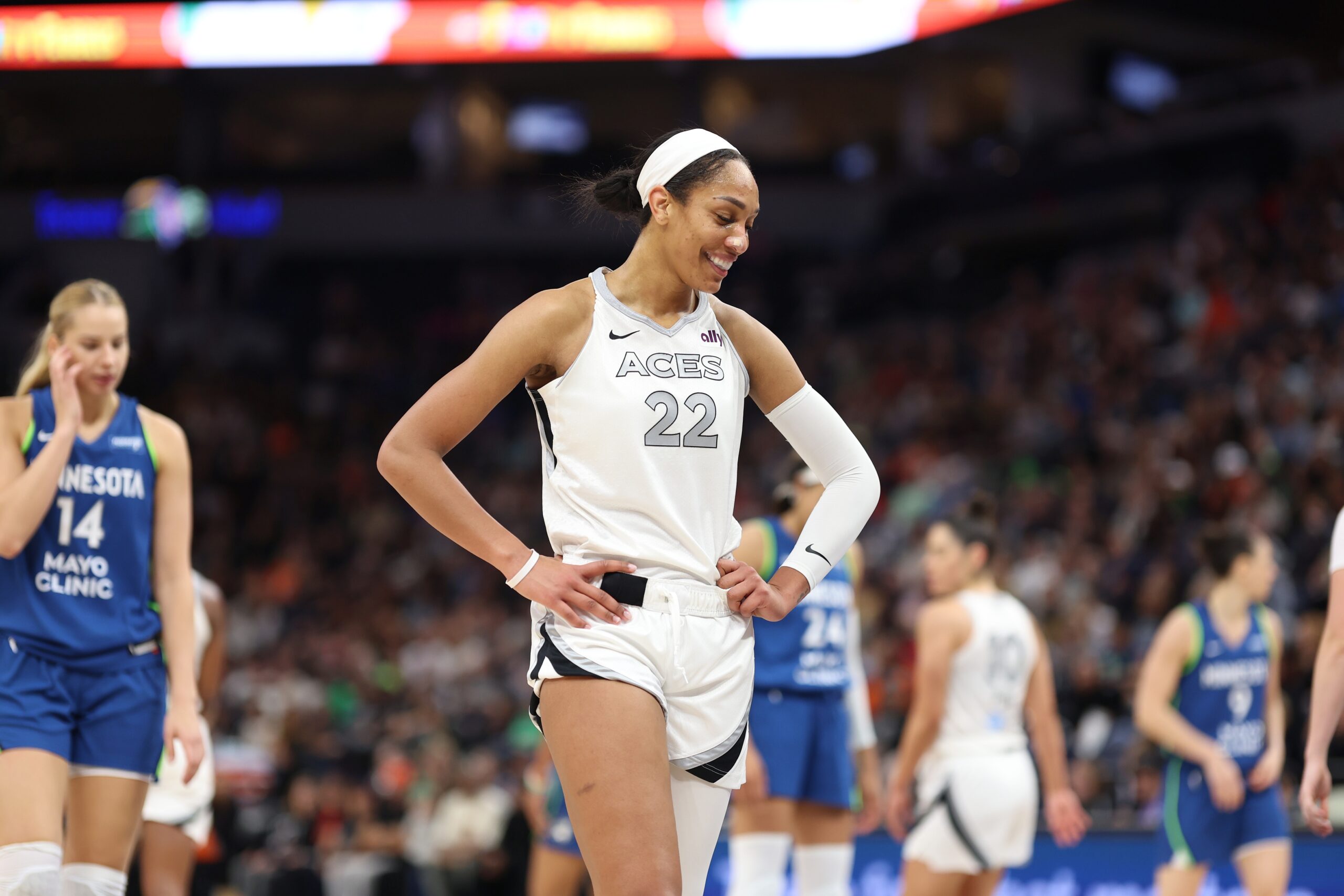 A’ja Wilson smiles on the basketball court