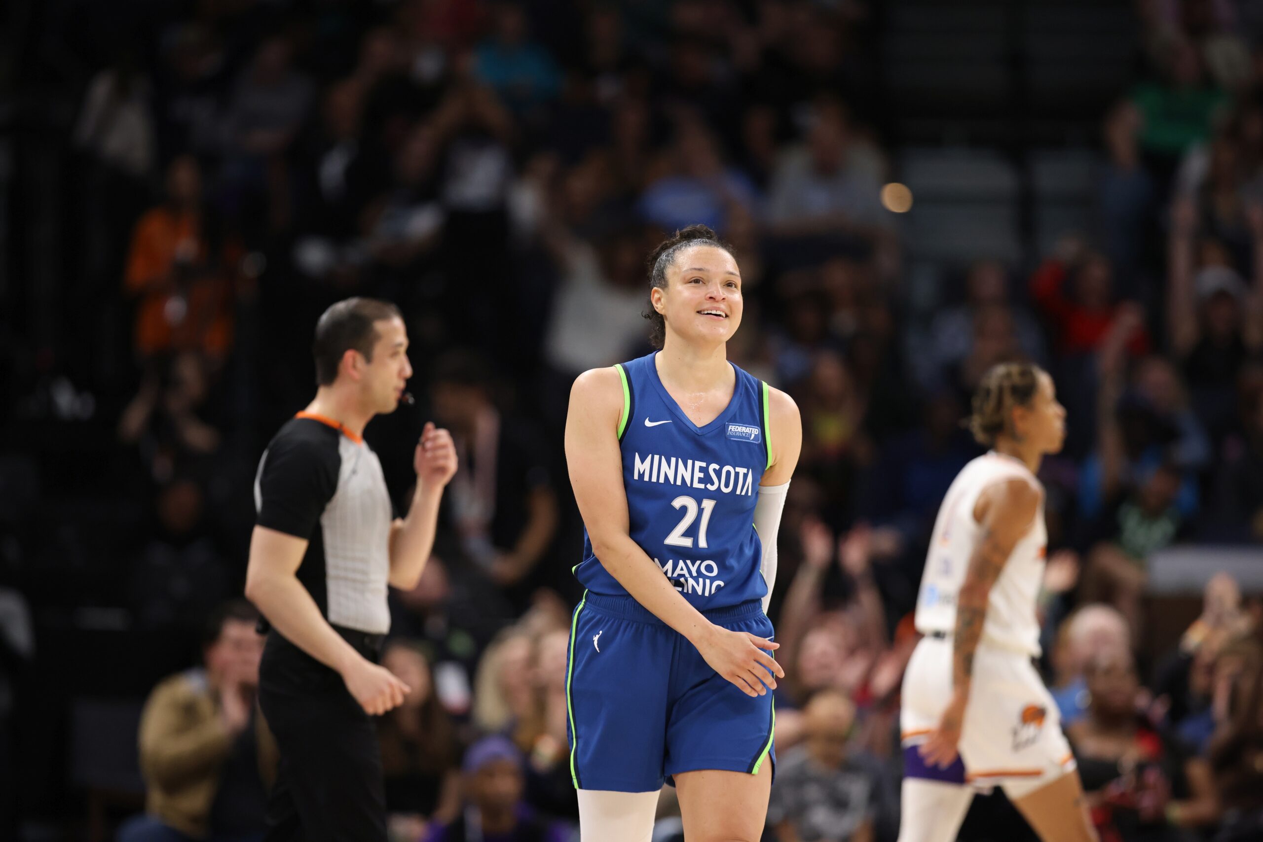 Minnesota Lynx guard Kayla McBride celebrates during a game against the Phoenix Mercury.