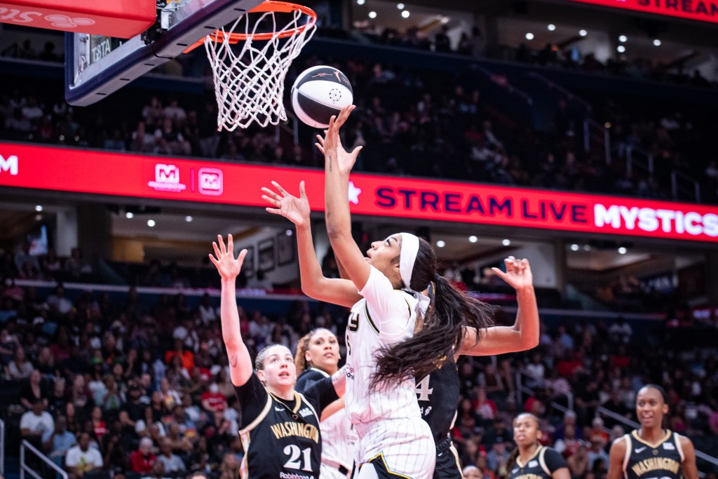Chicago forward Angel Reese goes up for a layup against the Washington Mystics