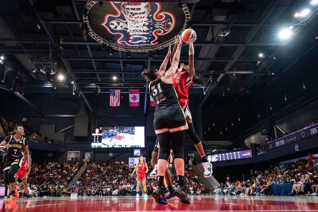 Tiffany Hayes grabs a rebound against the Washington Mystics’ Stefanie Dolson