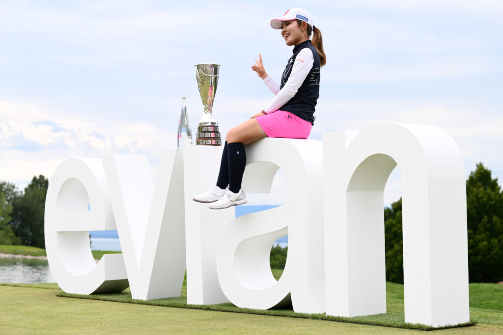 Ayaka Furue poses with her trophy after winning the Amundi Evian Championship 2024.