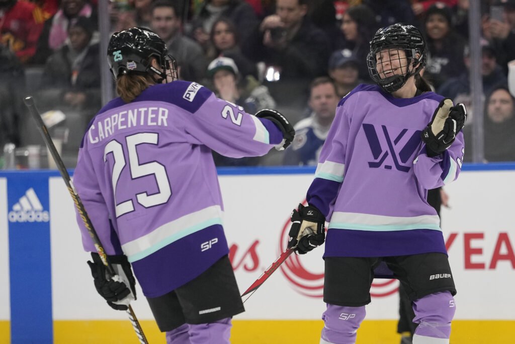 PWHL players celebrate during the 2024 PWHL 3-on-3 Showcase