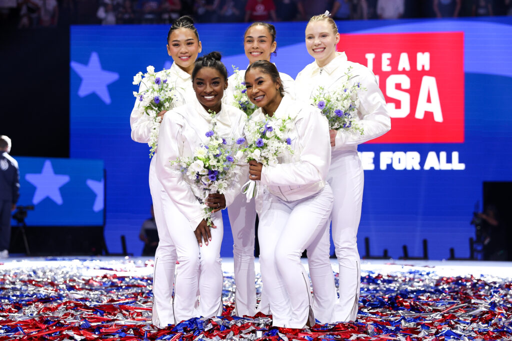 Jun 30, 2024; Minneapolis, Minnesota, USA; Sunisa Lee, Hezly Rivera, Jade Carey, Simone Biles and Jordan Chiles pose for a photo after being selected for the 2024 U.S. Olympic Women's gymnastics team during the U.S. Olympic Team Gymnastics Trials at Target Center. Mandatory Credit: Matt Krohn-USA TODAY Sports