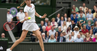 Elena Rybakina hits a forehand at the 2024 Wimbledon Championships