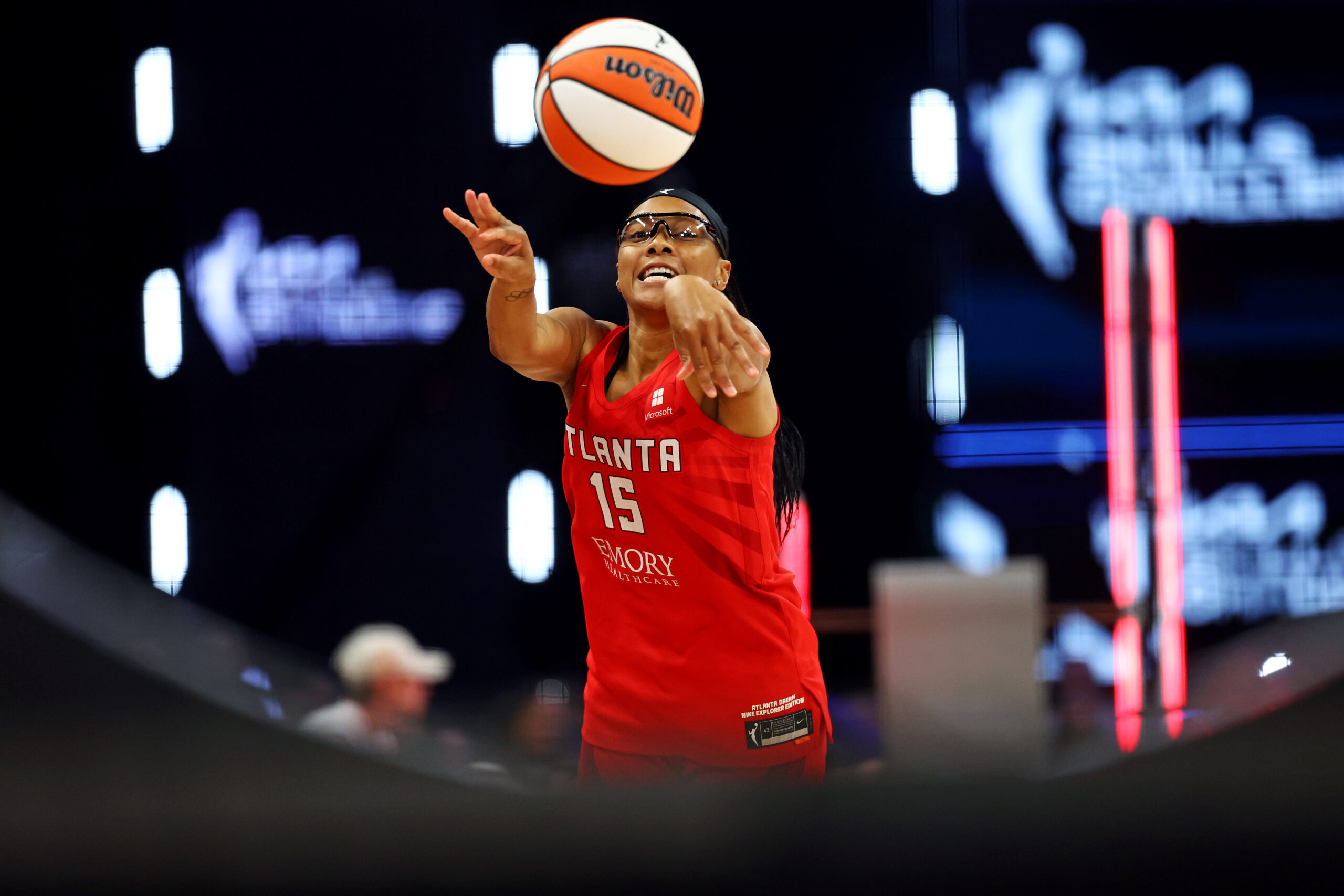 Atlanta Dream guard Allisha Gray throws a chest pass toward a target as part of the WNBA Skills Challenge.