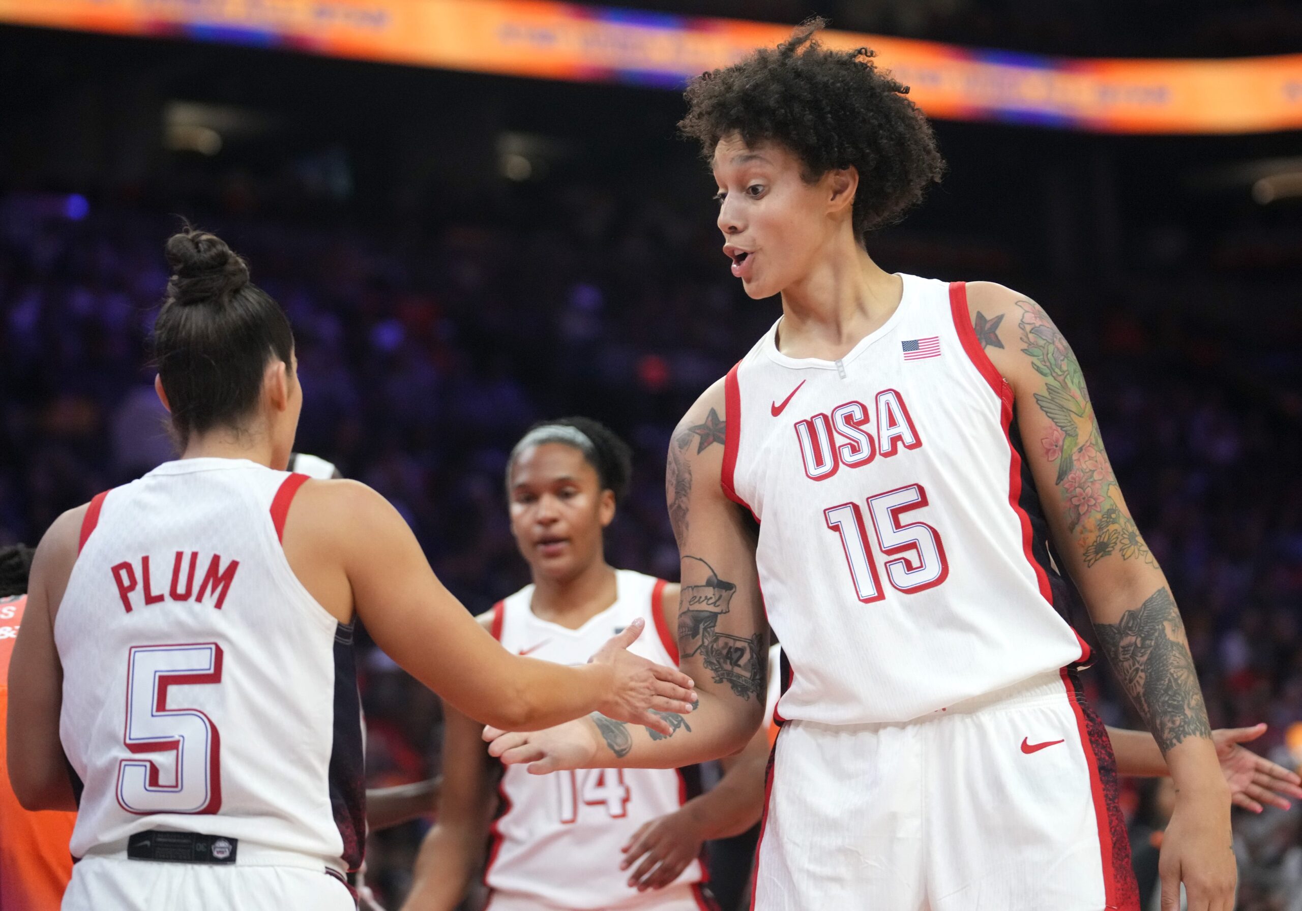 Team USA center Brittney Griner (15) high-fives teammate Kelsey Plum (5) during the WNBA All-Star Game against Team WNBA at Footprint Center in Phoenix on July 20, 2024. (Photo credit: Joe Rondone/The Republic / USA TODAY NETWORK)