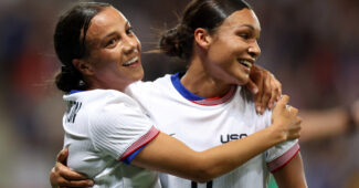 Mallory Swanson of United States celebrates scoring a goal with Sophia Smith with an embrace and a smile