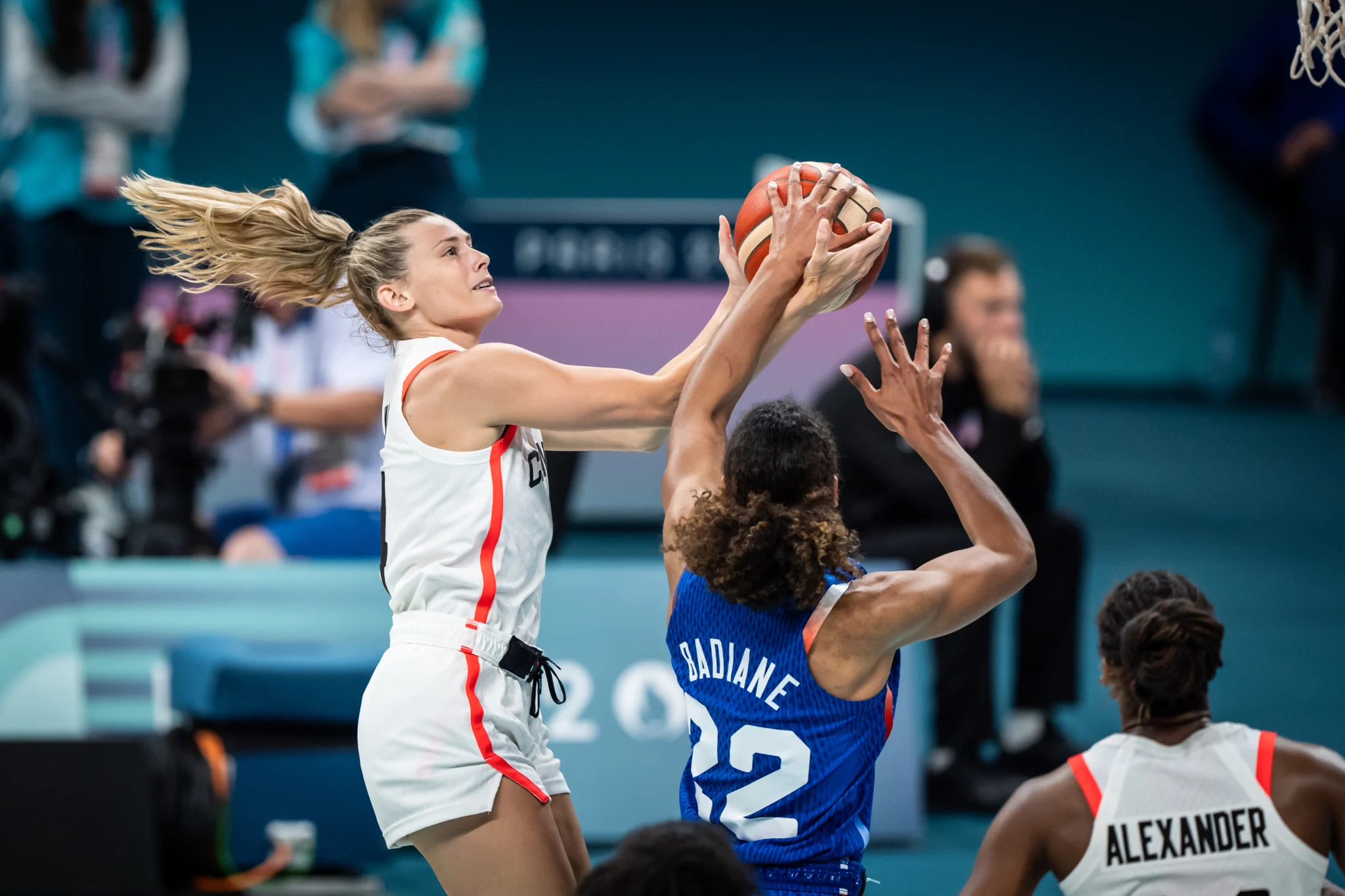 Canada’s Sami Hill has her shot blocked by France’s Marième Badiane