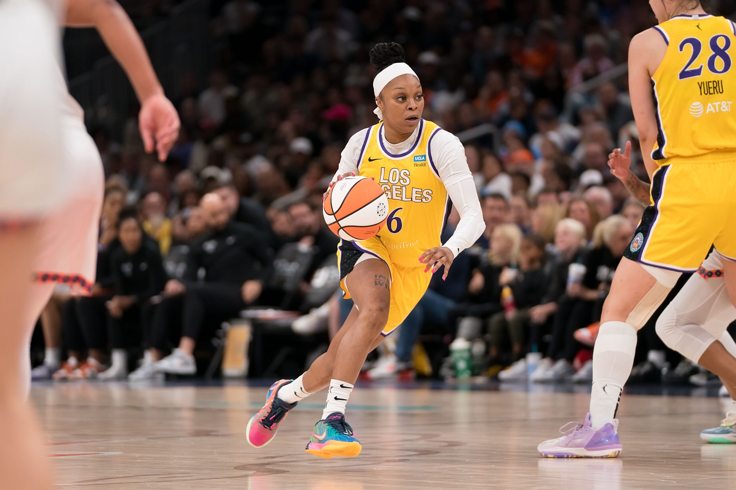 Los Angeles Sparks point guard Odyssey Sims dribbles in transition.