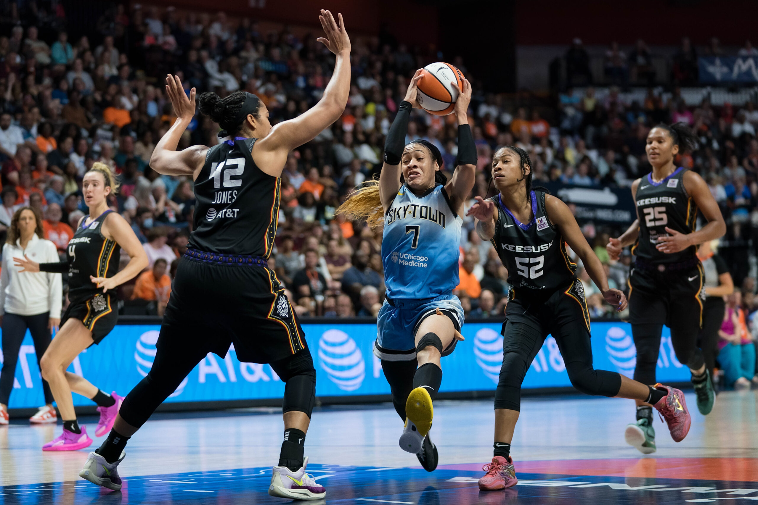 Chicago Sky guard Chennedy Carter drives hard into the lane