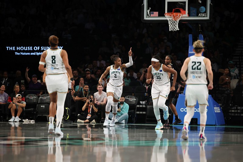 Kennedy Burke points her finger in the air