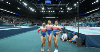Three Filipina-American gymnasts in Bercy Arena in Paris.