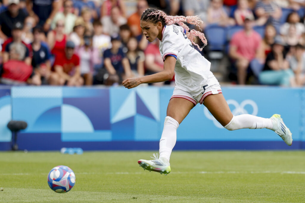 U.S. forward Trinity Rodman brings the ball up the field