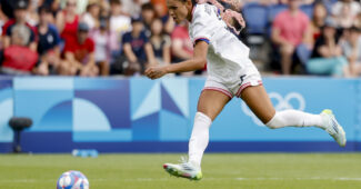 U.S. forward Trinity Rodman brings the ball up the field