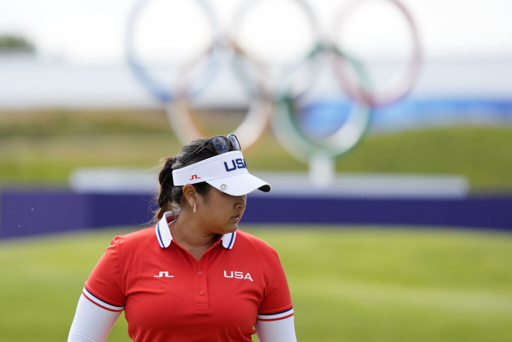 Lilia Vu (USA) lines up a putt on the 18th hole in the first round of women's individual stroke play during the Paris 2024 Olympic Summer Games at Le Golf National.