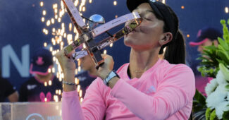 Jessica Pegula kisses her National Bank Open trophy
