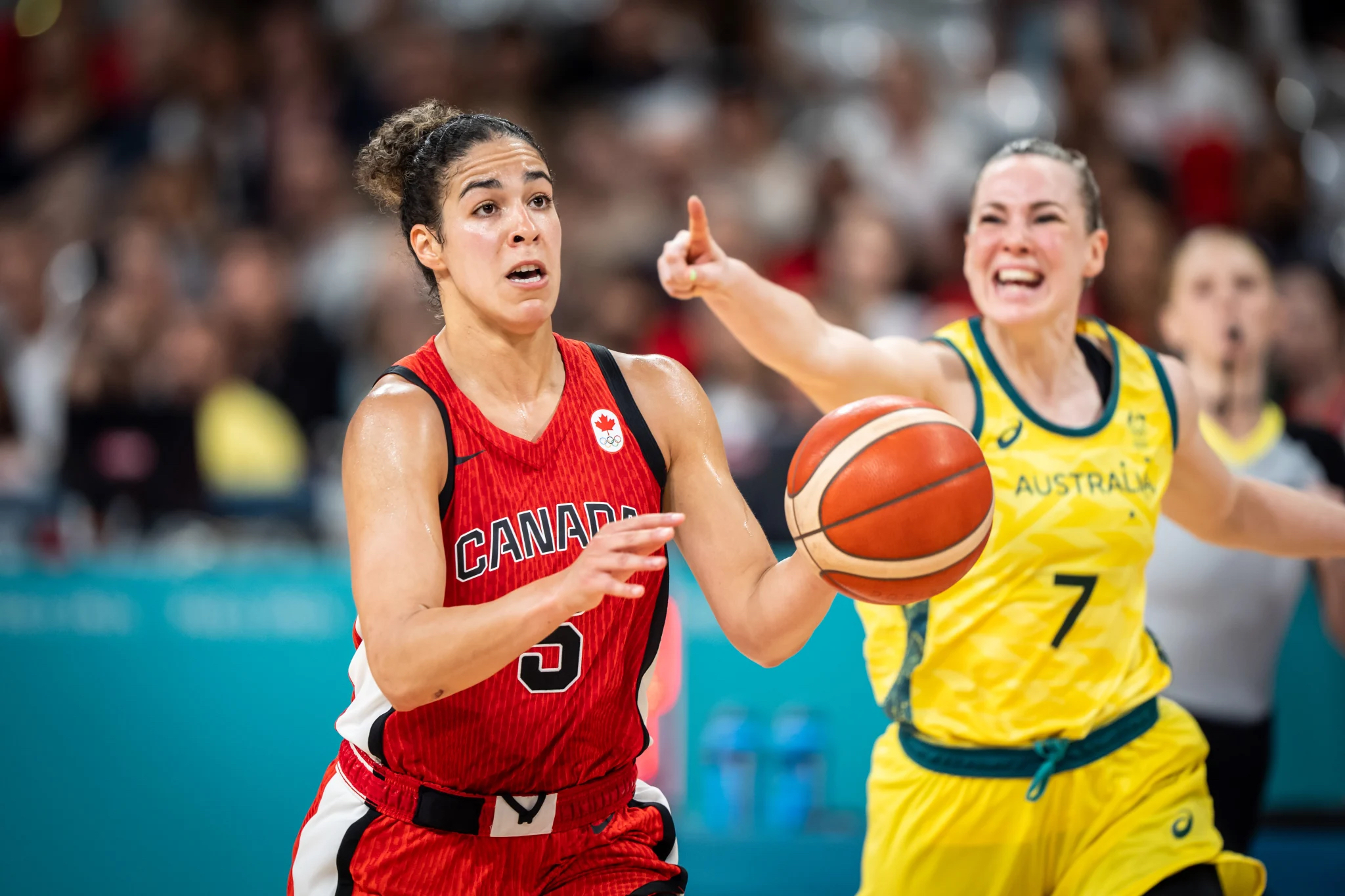 Canada's Kia Nurse dribbles the basketball.