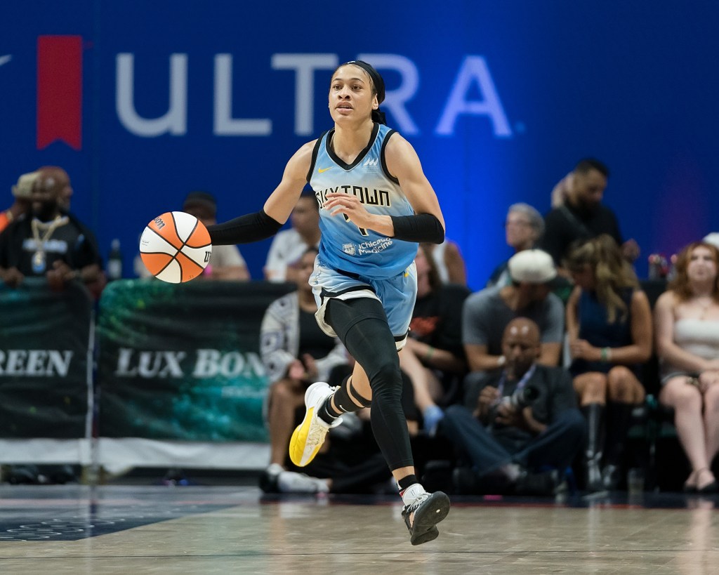 Chicago Sky guard Chennedy Carter dribbles the ball up the court