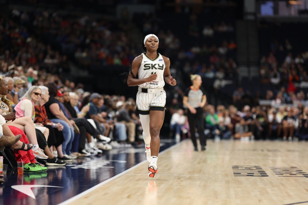 Chicago Sky guard Dana Evans jogs up the court