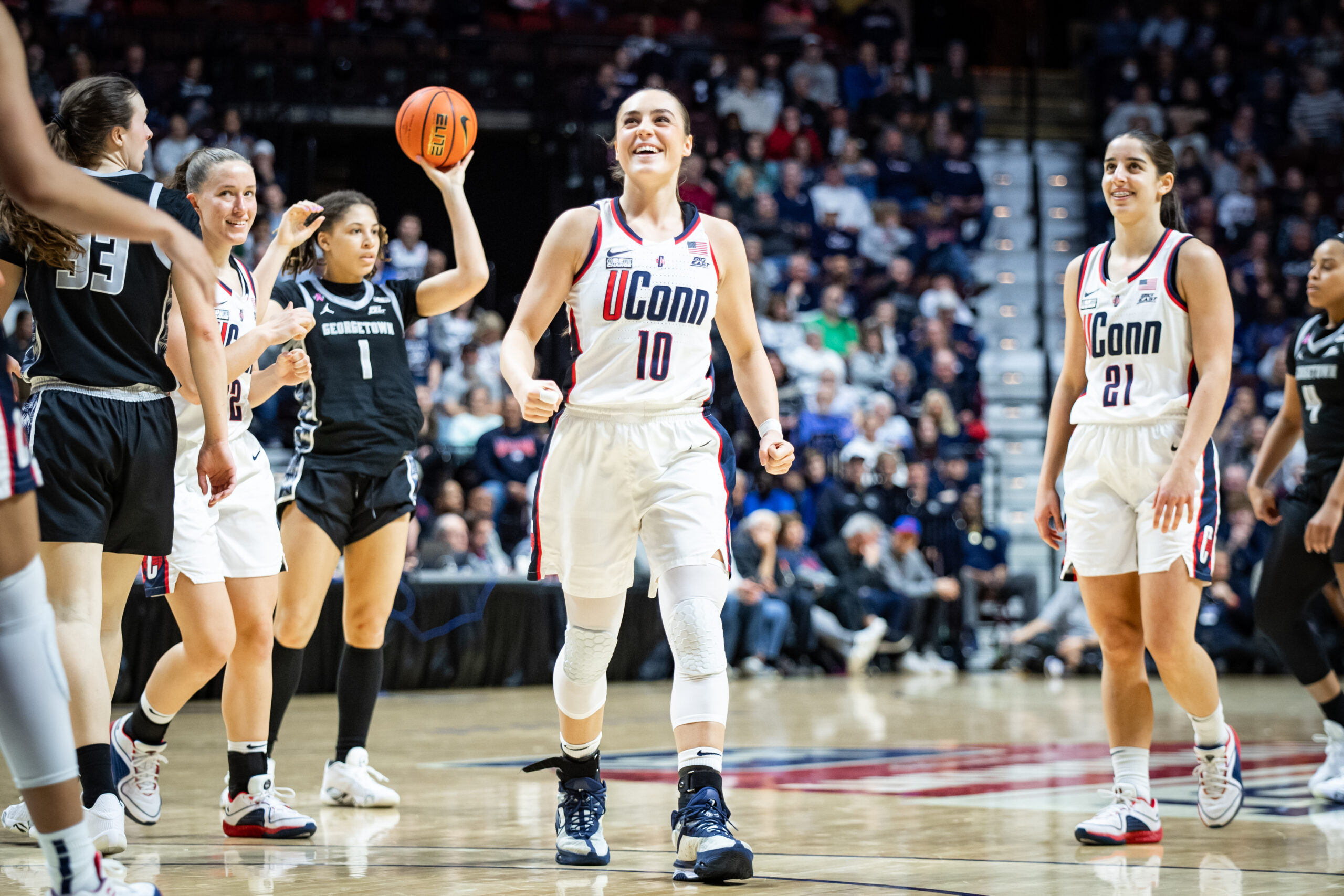 Former UConn guards Inês Bettencourt and Nika Mühl celebrate a play during the 2024 Big East Championship.