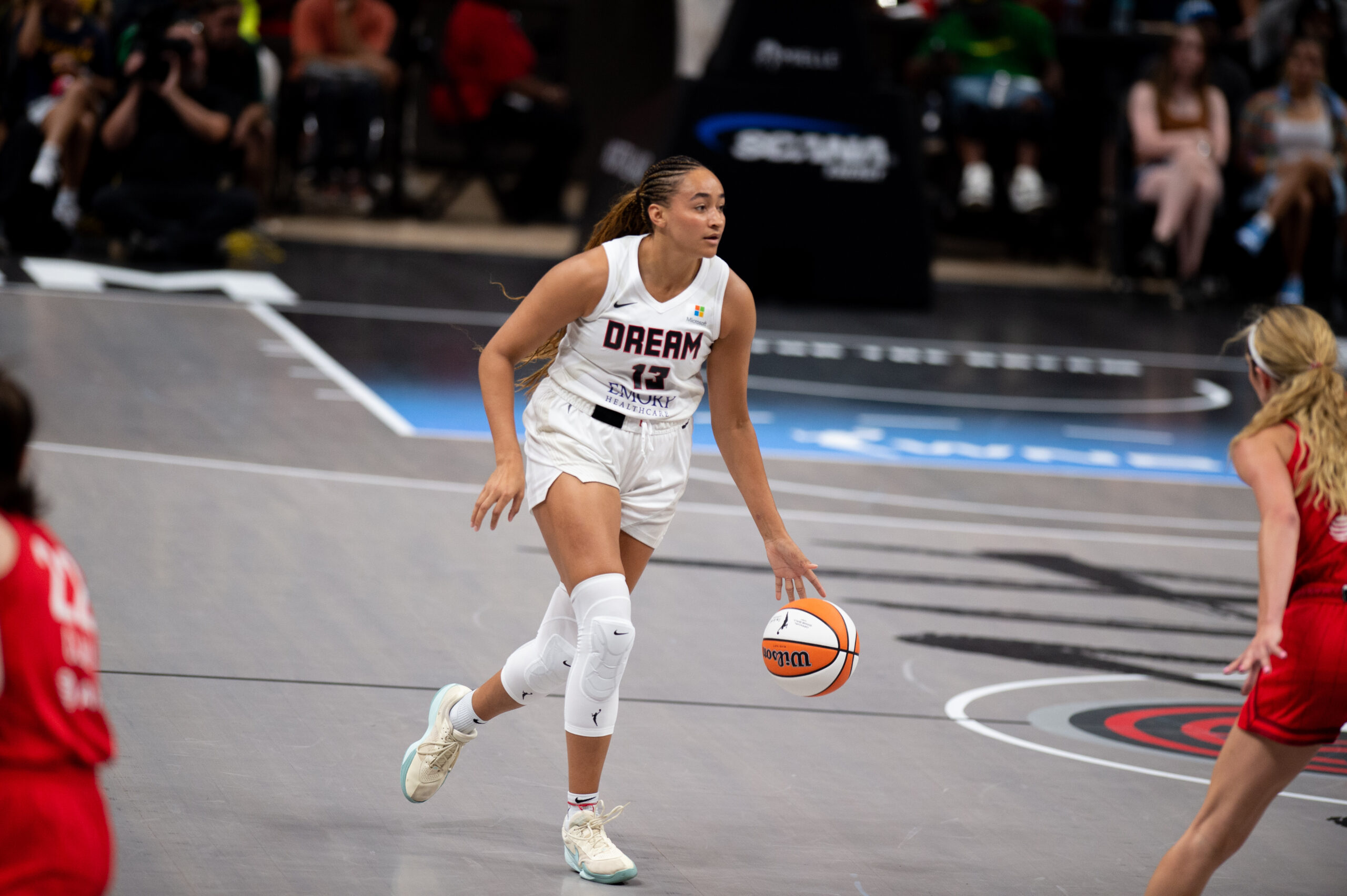 Haley Jones dribbles the ball up the floor for the Atlanta Dream.
