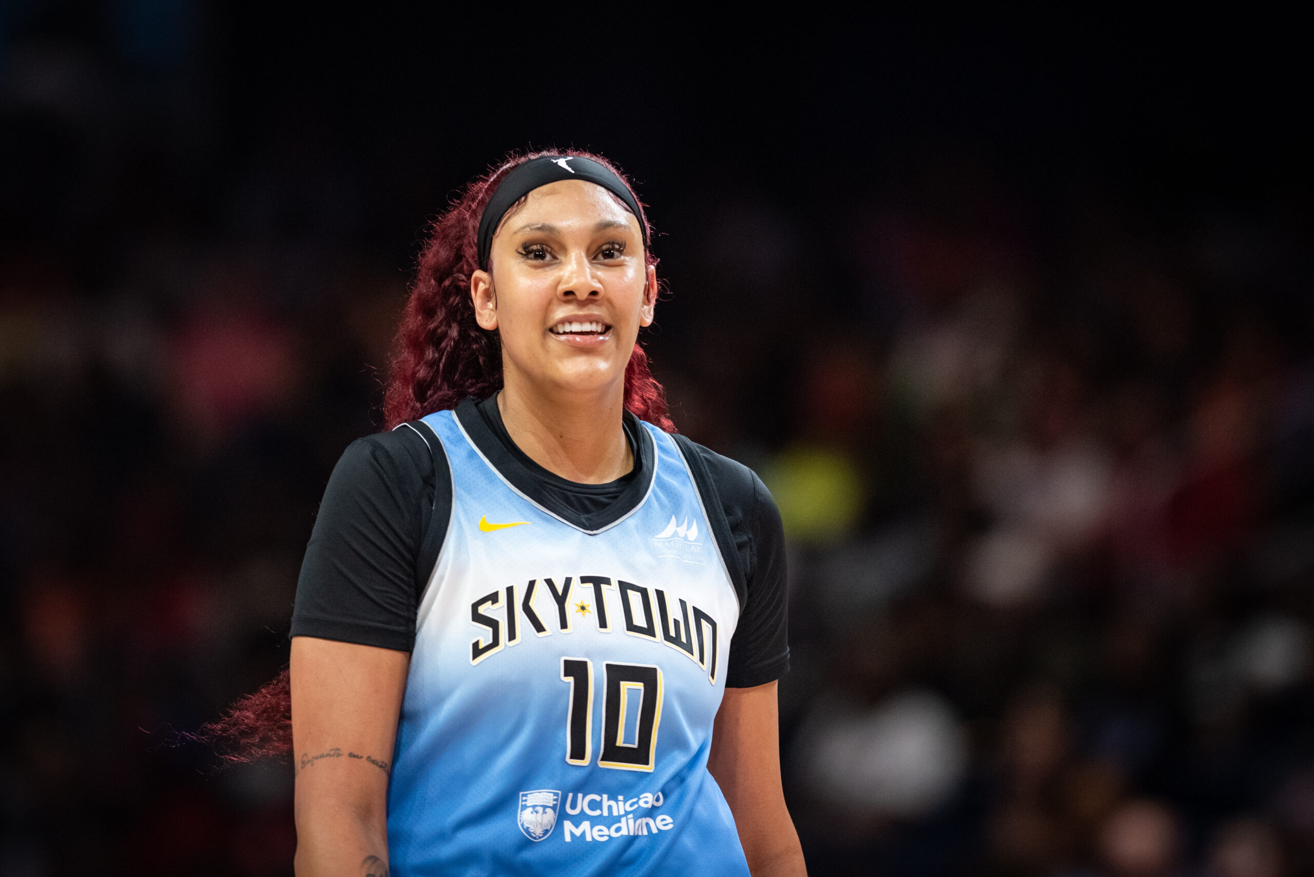 Chicago Sky center Kamilla Cardoso is shown from the waist up. She looks straight ahead.