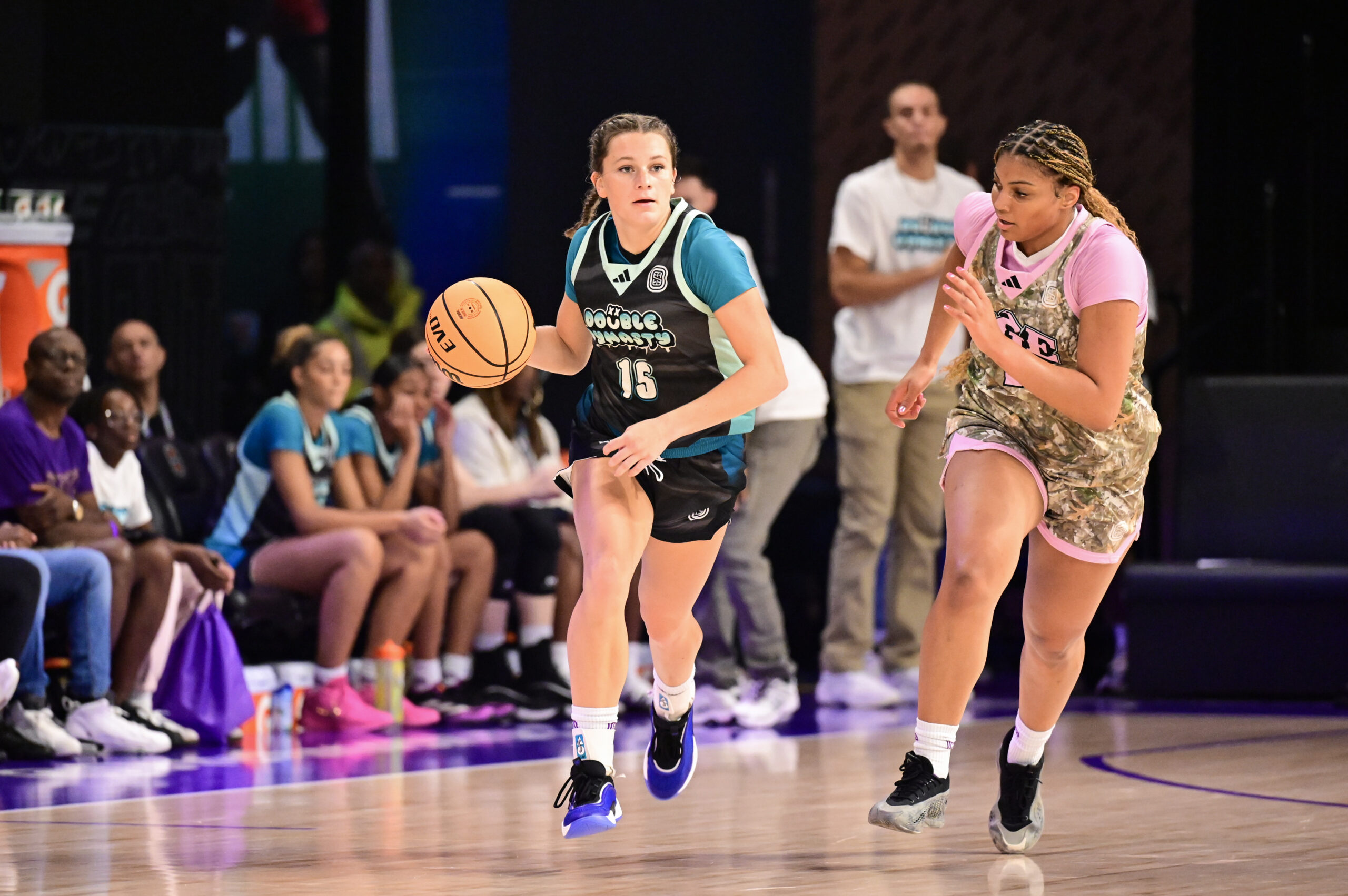 Kate Harpring #15 of the Double Dynasty dribbles the ball up the court during an OT Select game on Sunday, August 4, 2024 at OTE Arena in Atlanta, Georgia.