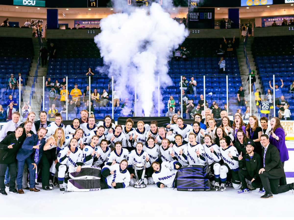 Minnesota poses for a team photo with all players and staff after winning the Walter Cup.