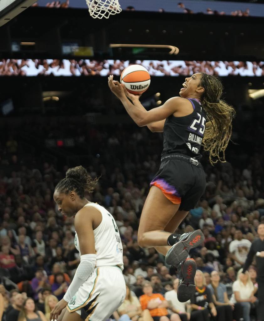Phoenix Mercury forward Monique Billings (25) jumps in the air to shoot a layup with her right hand