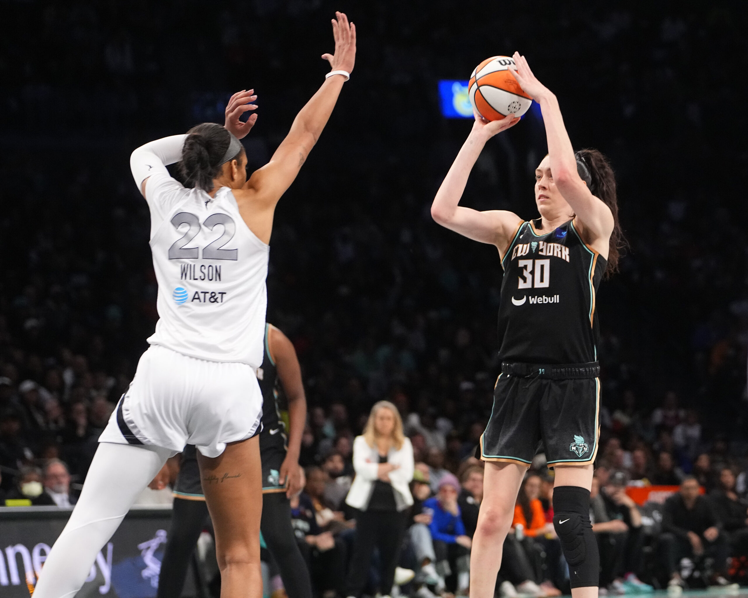 Breanna Stewart shoots a jump shot over A'ja Wilson