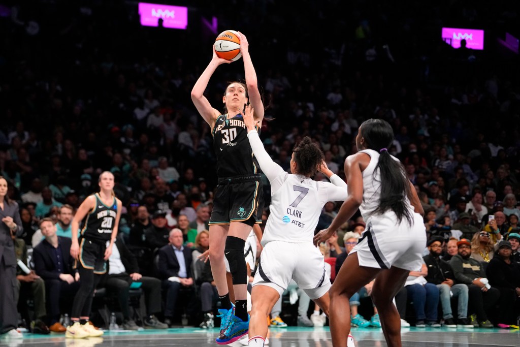 Breanna Stewart shoots over Alysha Clark with <a rel=