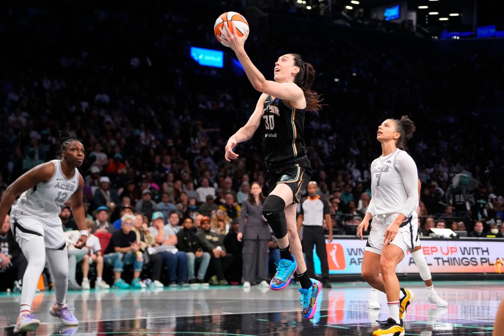 Liberty forward Breanna Stewart extends to the basket for a layup