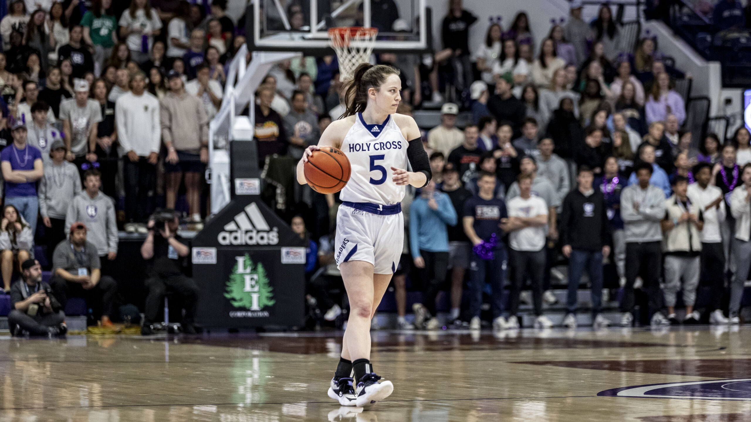 Junior point guard Kaitlyn Flanagan takes the ball up the court