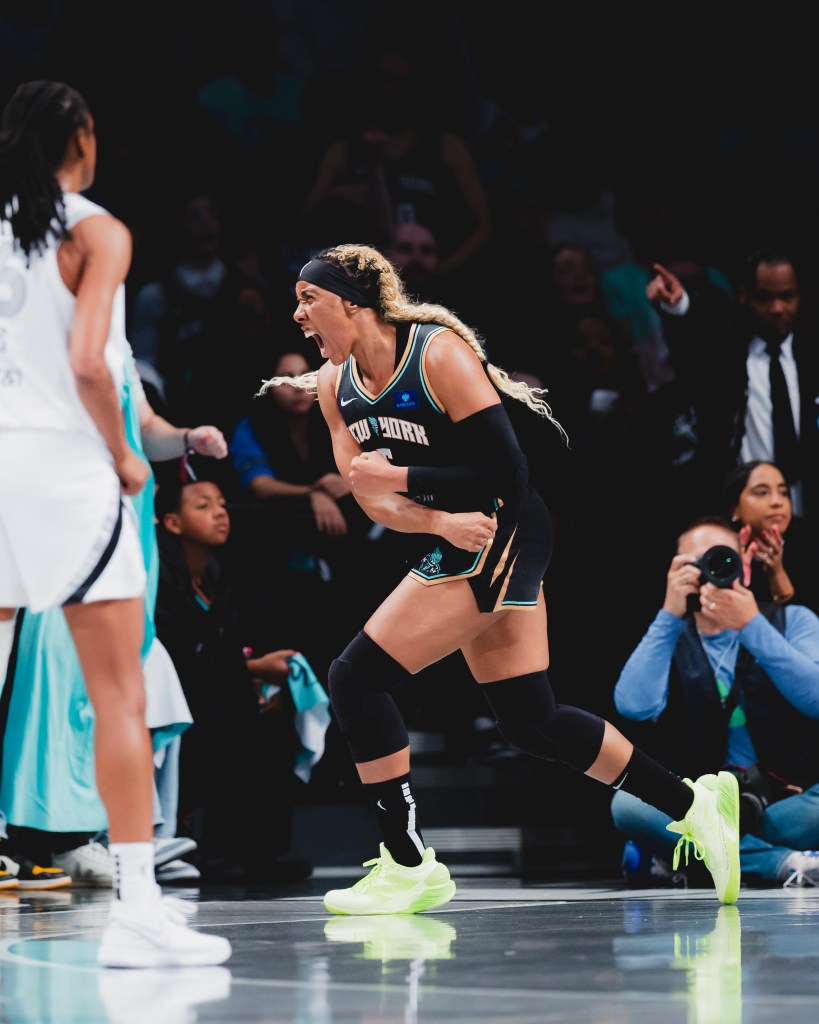 Kayla Thornton shouts in excitement 