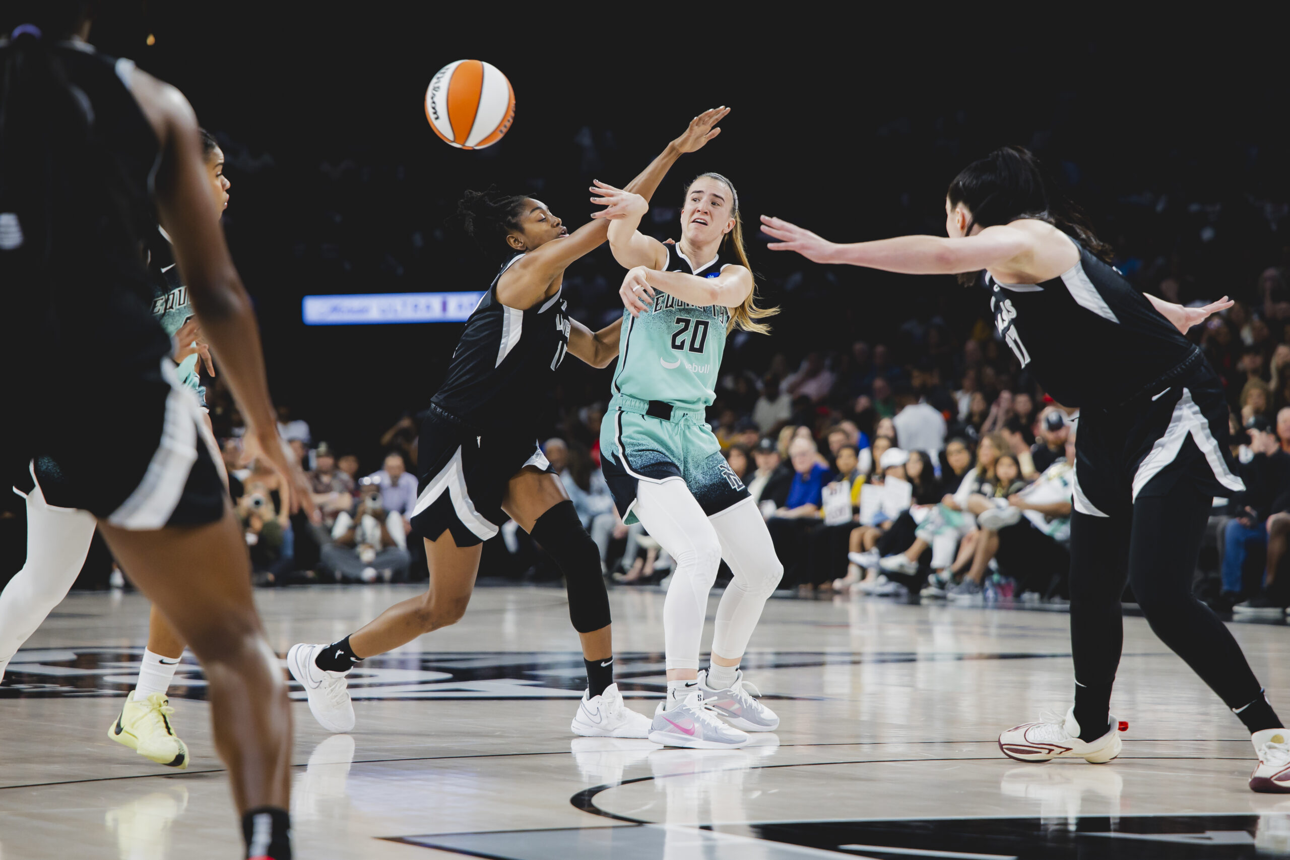 Sabrina Ionecsu passes out of a Las Vegas Aces double team
