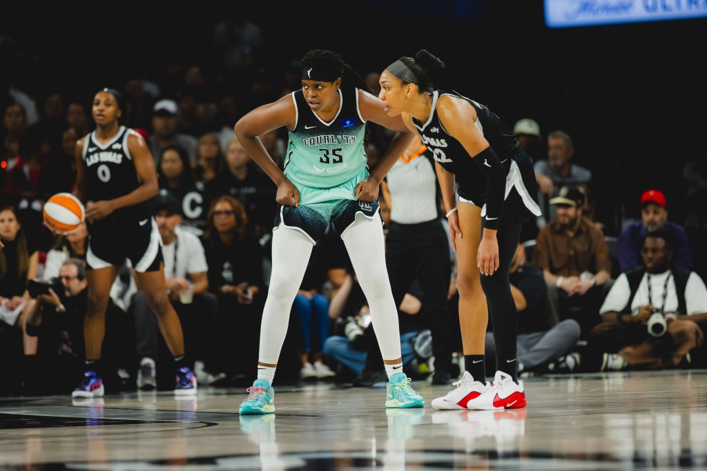 Jonquel Jones gets into guarding position