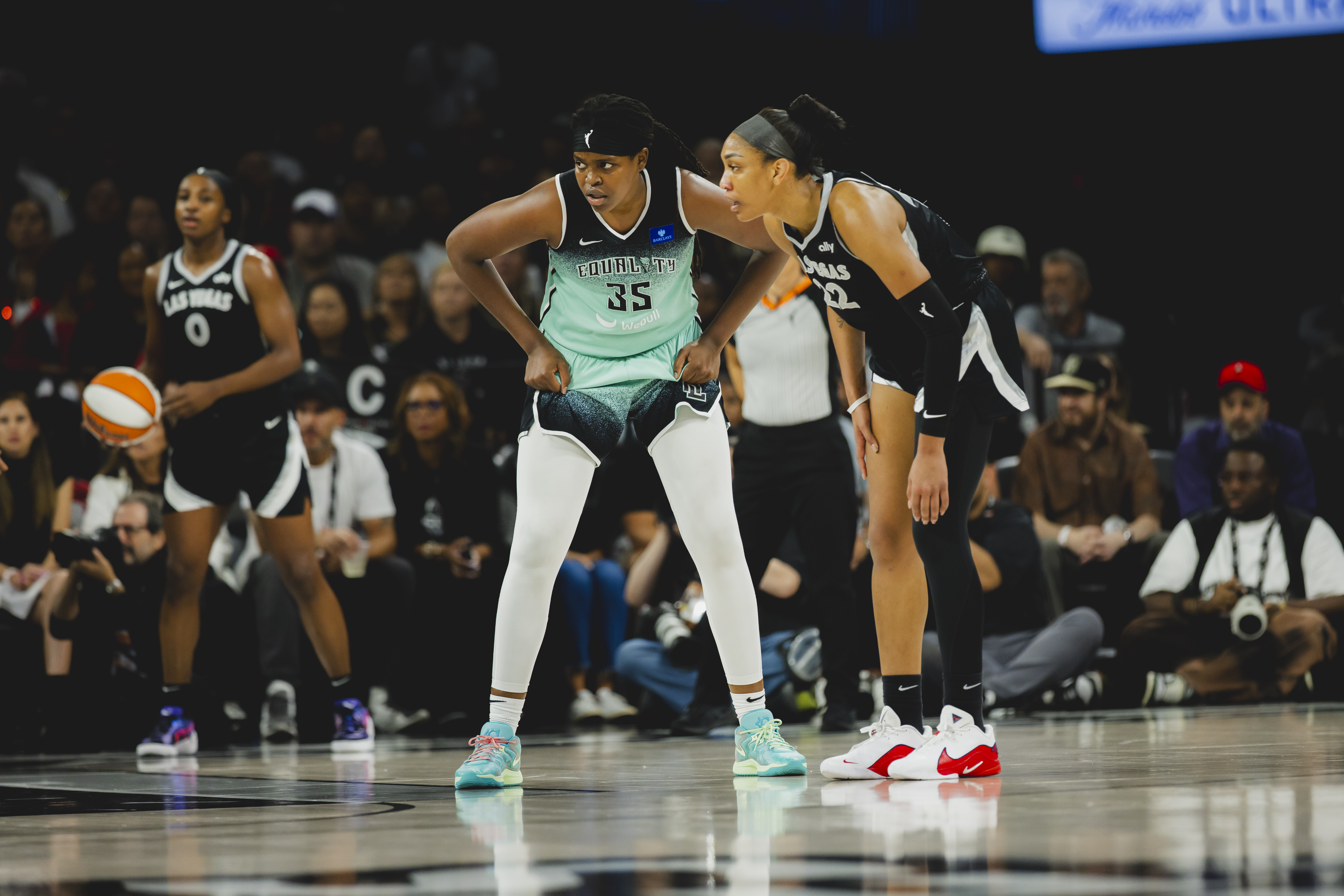 Jonquel Jones gets into guarding position