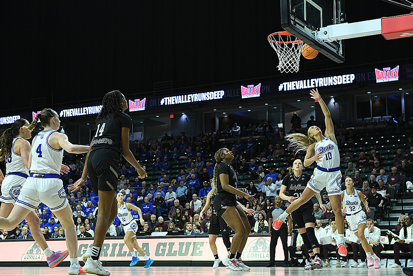 Drake guard Katie Dinnebier (10) drives to the basket